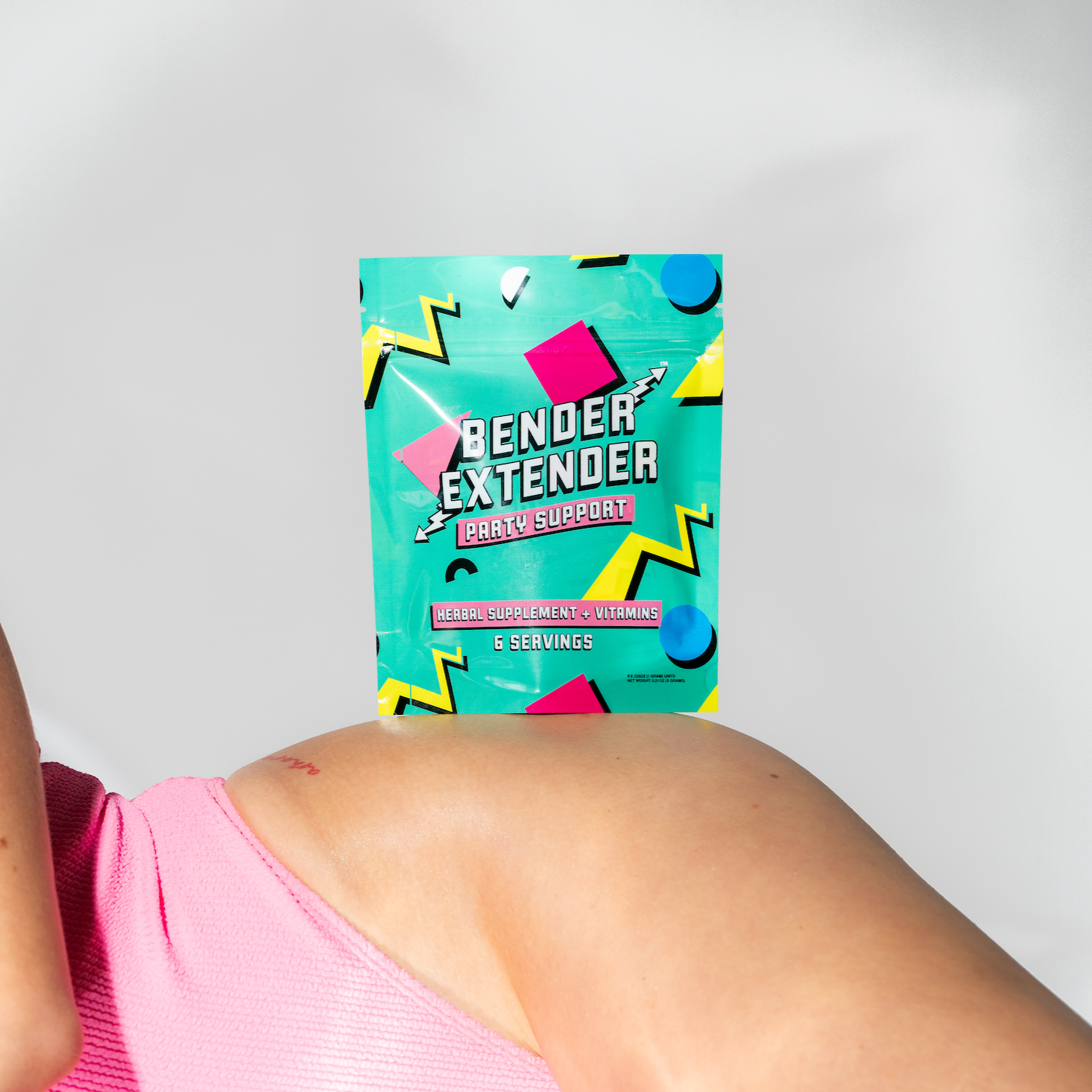 Person wearing pink underwear with a 'Bender Extender' product on a white background