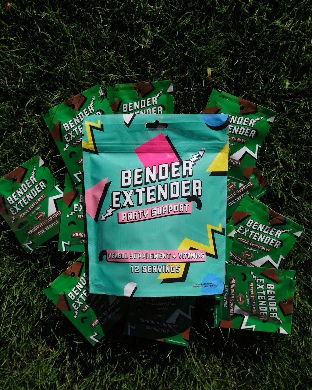 Bender Extender packets on a grassy background